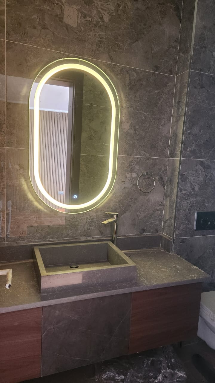 Bathroom fixtures showcase with illuminated mirror and vanity